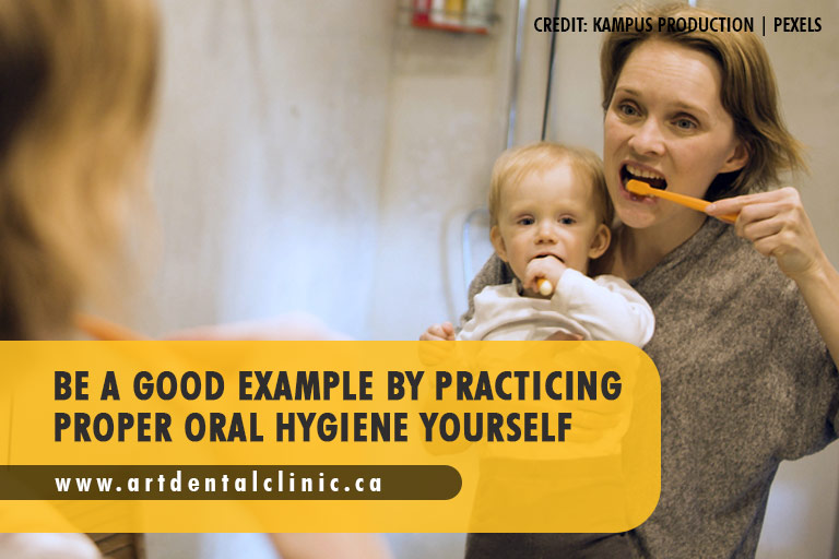Be a good example by practicing proper oral hygiene yourself