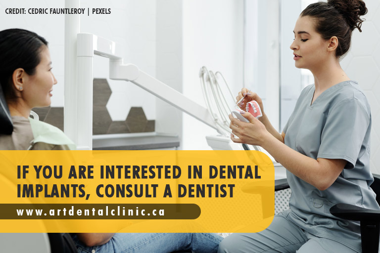 If you are interested in dental implants, consult a dentist